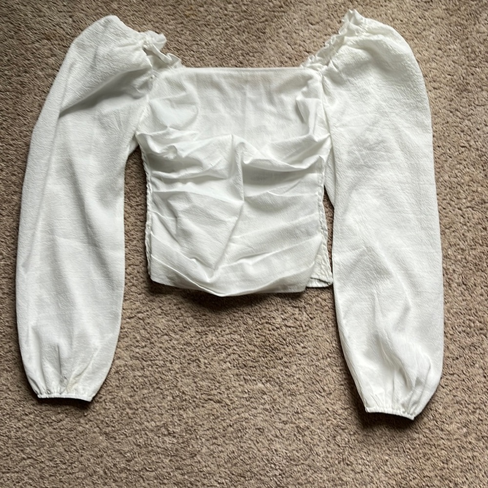 White long sleeve top
